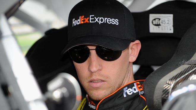 Denny Hamlin, shown here before the Aaron's 499 at Talladega Superspeedway, is trying to make the Chase after missing races with a broken back.