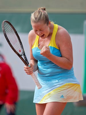 Shelby Rogers of the USA celebrates match point in her victory against Irena Pavlovic of France.