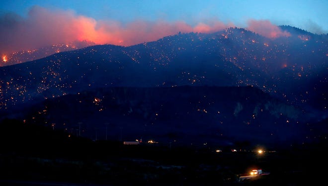 A wildfire burns into the Los Padres National Forest near Gorman, Calif., where the  blaze charred more than 3,000 acres of wild lands on May 15, 2013.