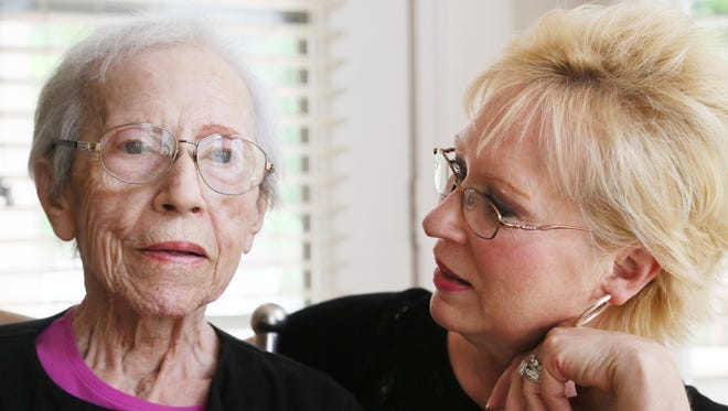 Bonnie Bitoff, 59, of Farmington Hills, Mich., cares for her 90-year-old mother, Alice Fritz. Bitoff has been able to get occasional breaks in providing round-the-clock care for her mother through the Area Agency on Aging Seniors, but those care services are now cut off and Bitoff cannot afford the care on her own.