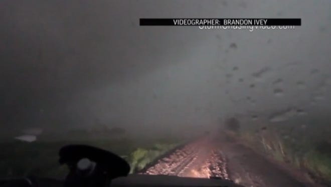 Storm chasers shot video as a tornado passes through in Kansas.