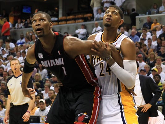 Chris Bosh limps off court in Heat-Pacers Game 4