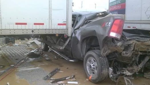 A pickup truck was crushed by semis during a huge wreck in Nevada that was caused by a sand storm late Monday.