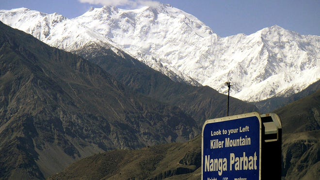 Nanga Parbat, the ninth highest mountain in the world, is seen from Karakorum Highway leading to neighboring China in Pakistan's northern area in 2004.