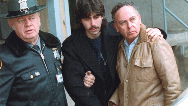 Jesse Friedman, center, and his father, Arnold, right, under arrest in 1989 from the documentary "Capturing the Friedmans."