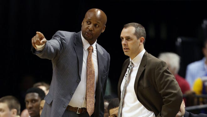Indiana Pacers assistant Brian Shaw, left, is now the Denver Nuggets coach