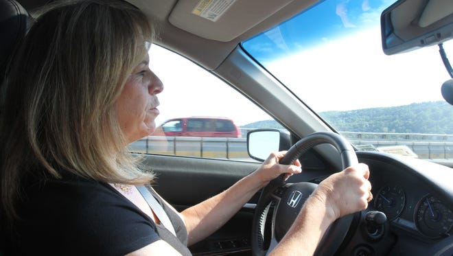 Renee Stala of Nanuet, N.Y., drives across the Tappan Zee Bridge during rush-hour traffic on June 5, 2013. A few years ago Stala was terrified of crossing the bridge until she sought the help of a counselor.