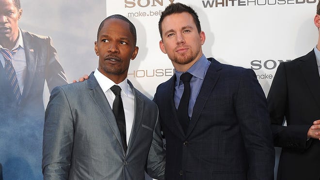 Jamie Foxx, left, and Channing Tatum  attend the 'White House Down' premiere in Washington on June 21. The film opens June 28.