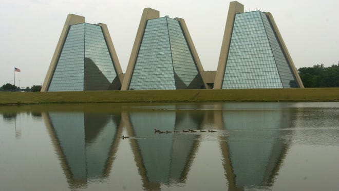 The Pyramids office buildings on Indianapolis' northwest side may have everything that a small alligator desires: a big pond, and in this 2005 photo, some ducks for dining.