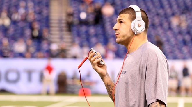 Aaron Hernandez was released from the Patriots, two hours after being arrested. He has been under investigation since June 18 in the slaying of acquaintance Odin Lloyd.