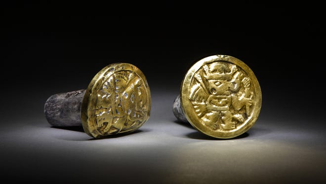 Images of winged beings adorn a pair of gold-and-silver ear ornaments a high-ranking Wari woman wore to her grave. Archaeologists found the remains of 63 individuals, including three Wari queens, in the imperial tomb at El Castillo de Huarmey.
