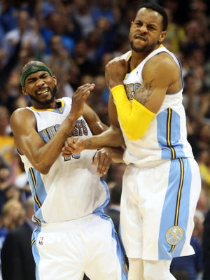 Nuggets swingmen Corey Brewer, left, and Andre Iguodala are free agents, and it's unlikely both will be back.