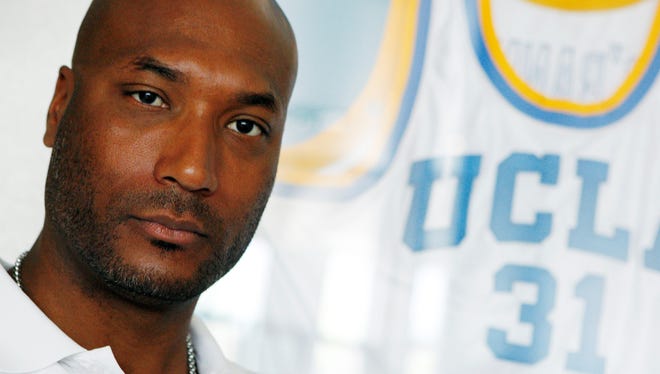 Former UCLA basketball player Ed O'Bannon Jr. sits in his office in Henderson, Nev. A lawsuit was initially filed by O'Bannon and several other former college athletes in 2009 who feel the NCAA is unfairly profiting from their likenesses and images in marketing deals with video games and others.