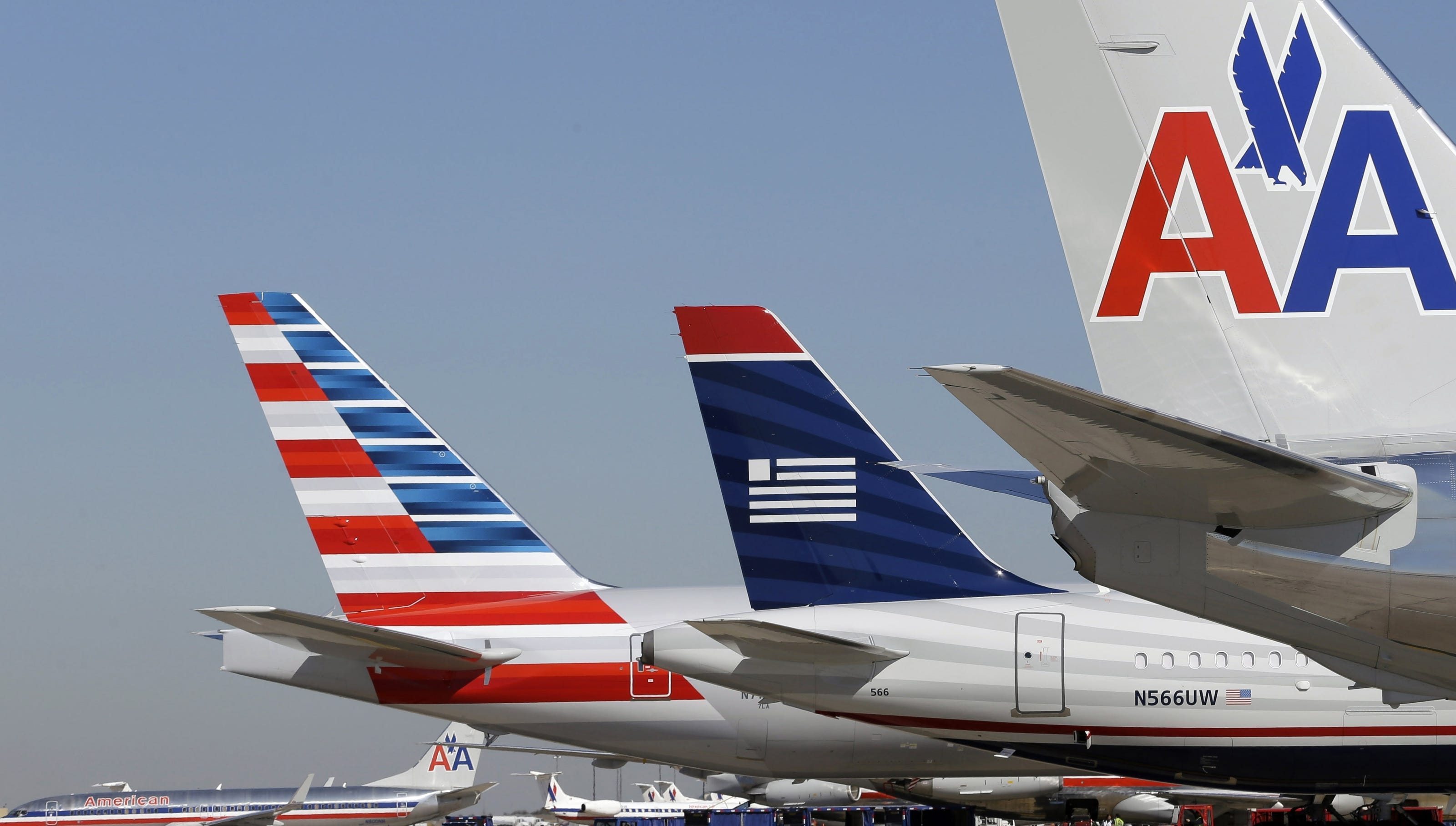 US Airways shareholders OK American Airlines merger