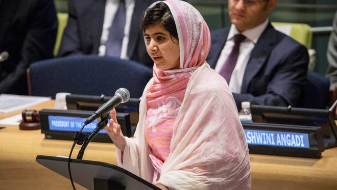 Malala Yousafzai, the 16-year-old Pakistani advocate for girls education who was shot in the head by the Taliban, speaks at the United Nations (UN) Youth Assembly on July 12, 2013 in New York City. The United Nations declared July 12, "Malala Day."