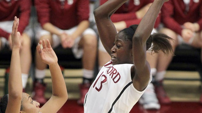 Stanford forward Chiney Ogwumike, right, led the Cardinal with 16 points and 11 rebounds as the top ranked Cardinal routed Long Beach State 77-41.