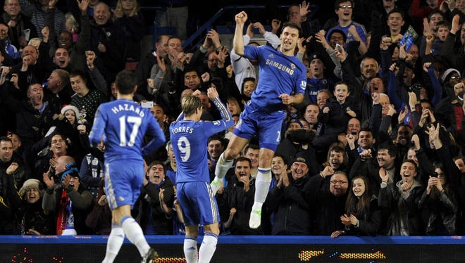 Chelsea's Branislav Ivanovic, right, celebrates scoring his teamss third goal.