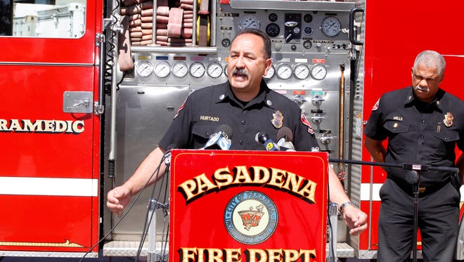 Art Hurtado, Pasadena Fire captain and paramedic, takes questions during a news conference in Pasadena, Calif., on Thursday.