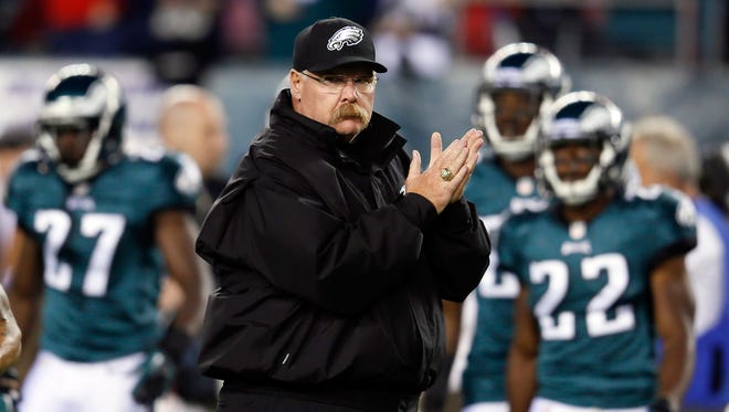 Head coach Andy Reid of the Philadelphia Eagles watches his team warm up.