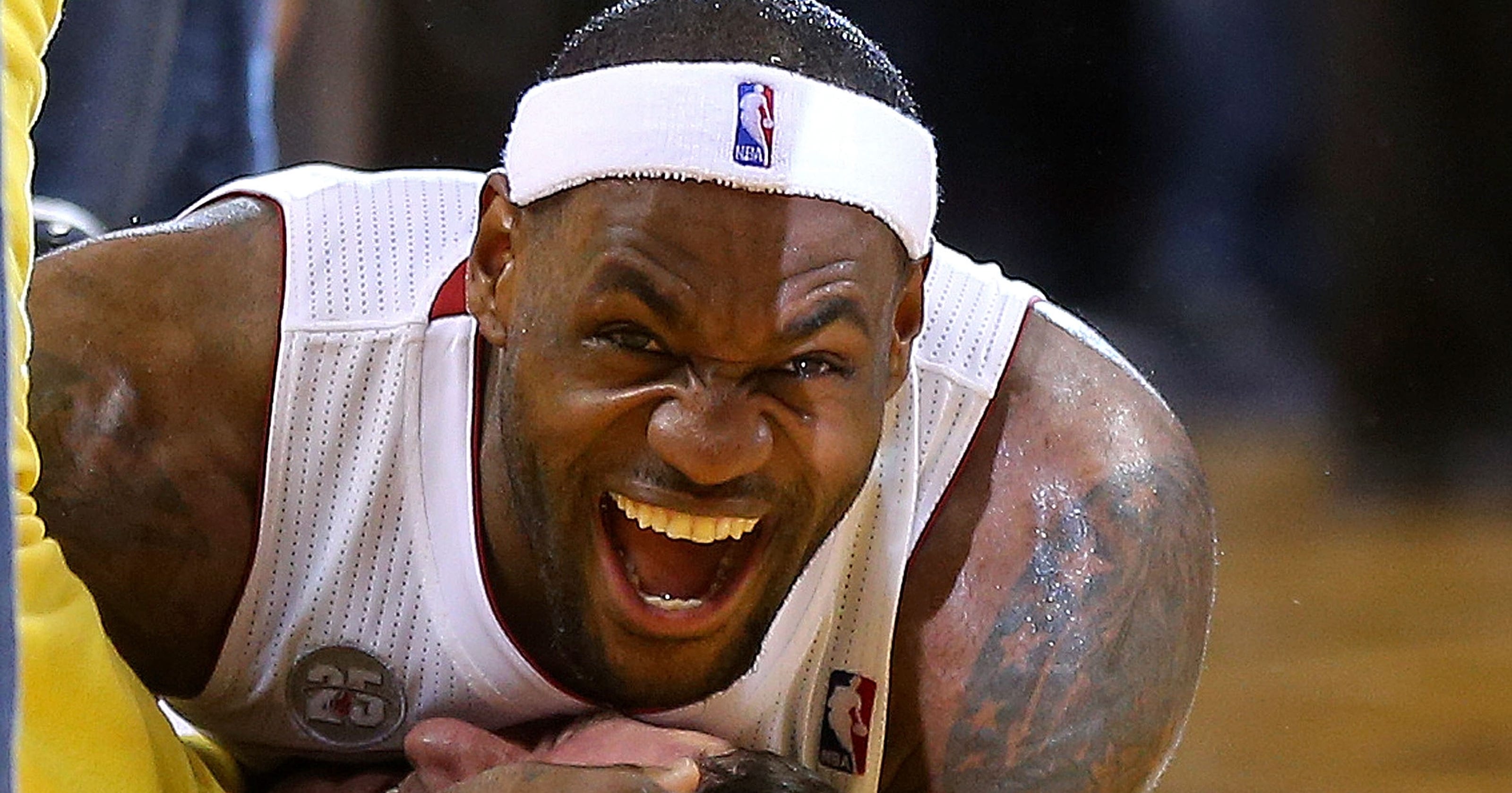 LeBron James tackles fan who hit halfcourt shot (VIDEO) LeBron James tackles fan who hit halfcourt shot (VIDEO)