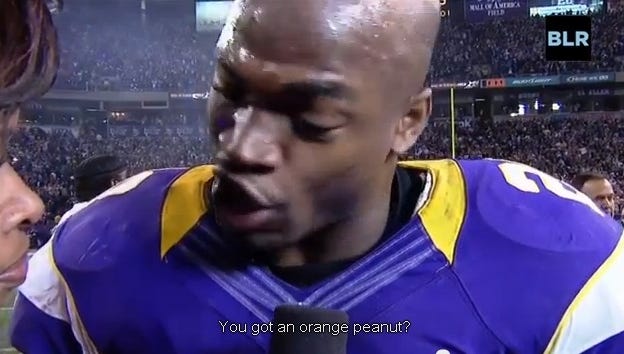 Adrian Peterson talking to Pam Oliver about orange peanuts.