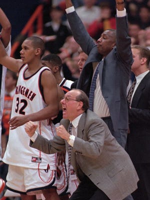 Syracuse coach Jim Boeheim reacts to his team's 77-72 overtime victory over Georgetown on March 1 in 1998.