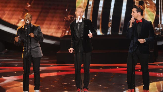Burnell Taylor, left, Devin Velez and Lazaro Arbos perform on 'American Idol.'
