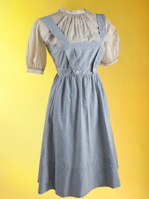 The original costume worn by Judy Garland in the film 'The Wizard of Oz' will be offered at auction by Julien's Auctions in Beverly Hills.