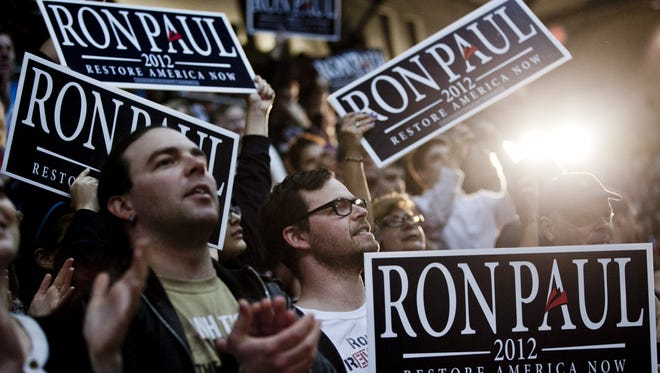 Supporters listen to Ron Paul speak at the University of Maryland in March. 