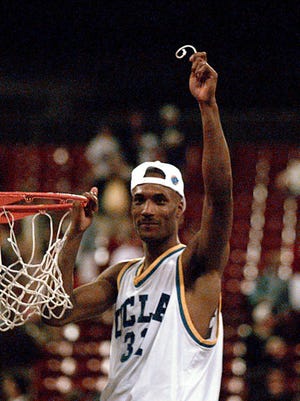 Ed O'Bannon cuts down the nets after winning the 1995 NCAA tournament with UCLA.