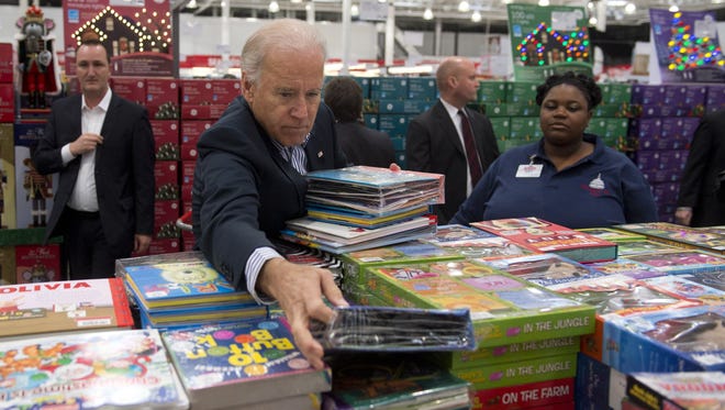 Vice President Biden buys some books at Costco.