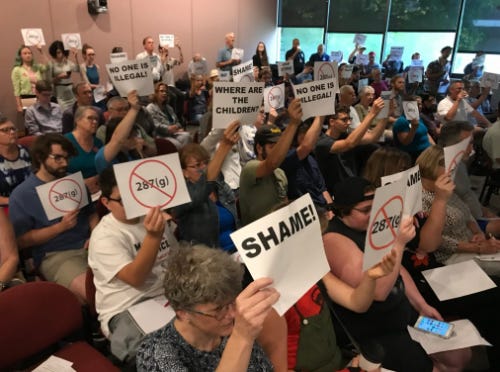 Protesters at the Knox County ICE meeting in Knoxville on Wednesday, July 11, 2018.