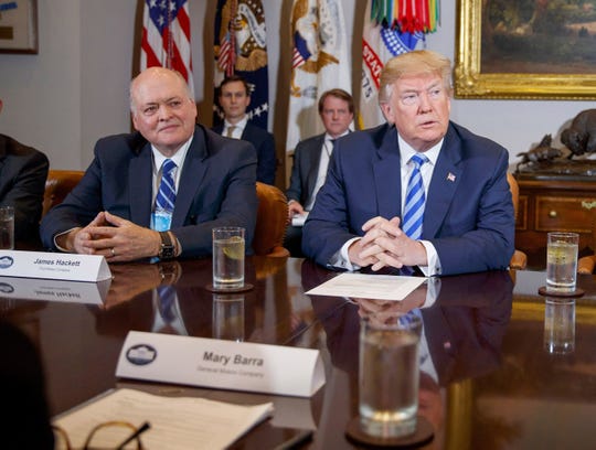 Ford CEO James Hackett and President Donald Trump during a meeting with automotive executives in the White House, Friday, May 11, 2018, in Washington.