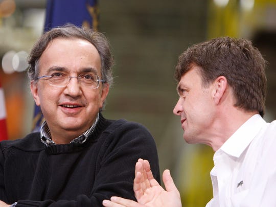 In this Friday, May 21, 2010 file photo, Chrylser CEO Sergio Marchionne, left, is seen with Jeep brand President and CEO Mike Manley at the Jefferson North Assembly Plant, in Detroit.