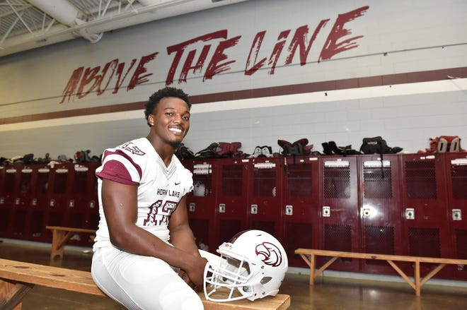 Nakobe Dean, one the highest rated players in Mississippi, sits in the locker room of Horn Lake High School.