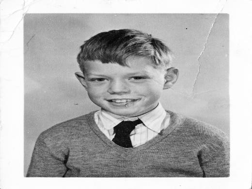 DARTFORD,UNITED KINGDOM - CIRCA 1951: (EMBARGOED FOR PRINT USAGE UNTIL THURSDAY JULY 2ND 2015) A school photo of a 9 year old Mick Jagger (1951) at Wentworth Junior County Primary School in his home town Dartford. This previously unseen image will form part of The Rolling Stones - 'Exhibitionism' at Londons Saatchi Gallery. Mick Jagger, Keith Richards, Charlie Watts and Ronnie Wood have opened their personal archives and found never before seen photographs of themselves as youngsters. These along with hundreds more rare and unseen images will create the first ever international Rolling Stones exhibition which will open at the Saatchi Gallery in April 2016. (Photo by Stones Archive/Getty Images) ORG XMIT: 561825389 ORIG FILE ID: 479111158