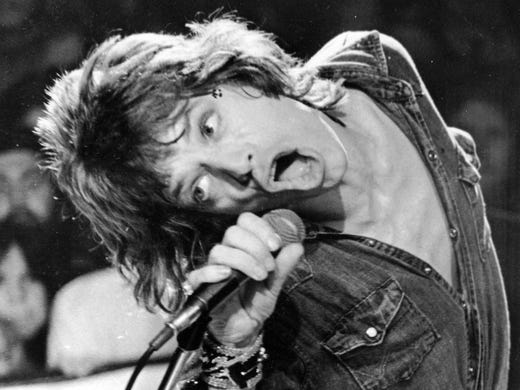 ORG XMIT: NYET166 FILE - This July 24, 1972 file photo shows Mick Jagger of the Rolling Stones during a performance in San Francisco. Thursday, July 12, 2012, marks 50 years since Jagger played his first gig with the band. Now in their late 60s and early 70s, the band members are celebrating the anniversary by attending a retrospective photo exhibition at London's Somerset House _ and looking to the future by rehearsing for new gigs. (AP Photo, file)