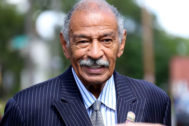 Congressman John Conyers  Jr. attends the Help us Grow Detroit event to unveil the Brush Street mural in Detroit's North End neighborhood on Thursday, August 14, 2014.