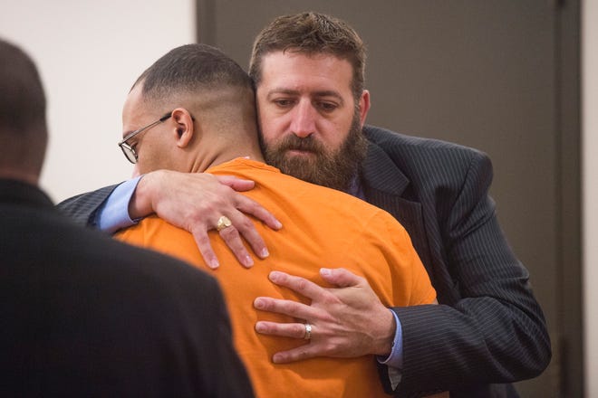 Lawrence Greggs is embraced by his attorney Jeffrey Schwartz after receiving the maximum sentence of 80 years for his role in the death of Devon Smeltz during sentencing at the Larimer County Justice Center on Thursday, July 26, 2018. Greggs, 21, was with two others when he shot and killed Smeltz in the Timnath Walmart parking lot in 2016 during what the court called, "a drug deal gone bad."