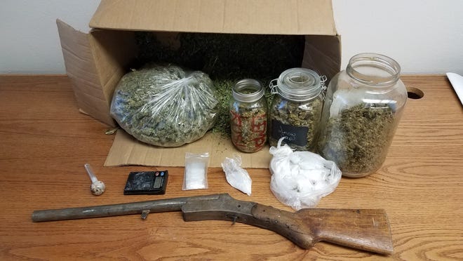 Tulare County detectives uncover marijuana and methamphetamine during a bust on Wednesday.