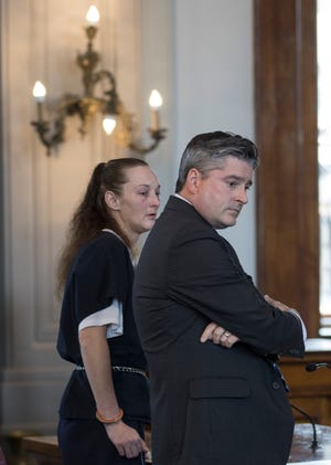 Sandy France and her public defender listen to the 24-month recommendation given by the Ross County Prosecutor's Office regarding her connection to the death of Jason Bartley Monday afternoon.