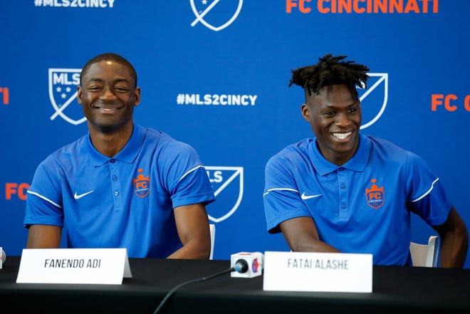 New FC Cincinnati signees Fanendo Adi and Fatai Alashe take questions during a press conference at Nippert Stadium in Cincinnati on Monday, July 30, 2018.