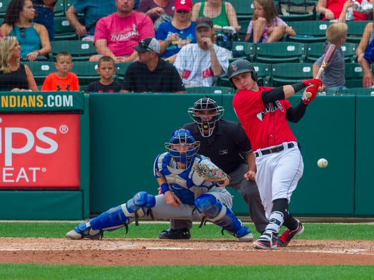 Indianapolis Indian's Wyatt Mathisen (19) hits a grounder to shortstop. The Indianapolis Indian's hosted the Buffalo Bisons in Minor League Baseball action at Victory Field, Sunday, July 29, 2018. The Tribe lost 2-1 in the front side of a double-header.