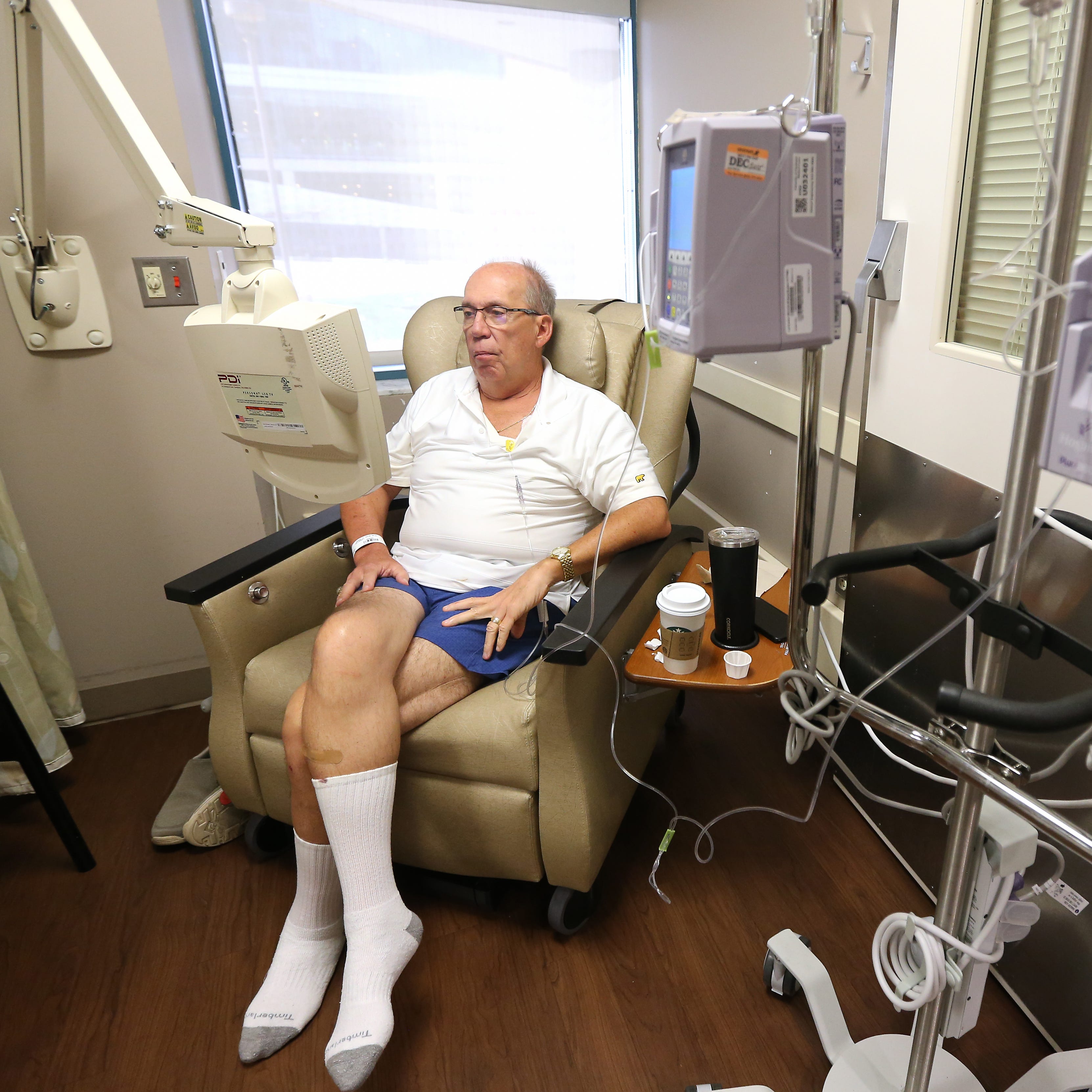 Bob Rulli undergoes a transfusion of the experimental drug BXQ-350, which lasted about an hour, Tuesday, July 10, 2018, at the University of Cincinnati's Barrett Cancer Center in Cincinnati.