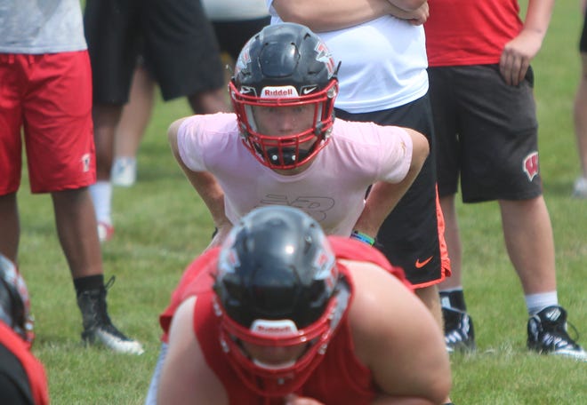 Muskego running back RJ Bosshart lines up for a drill during practice on August 1.