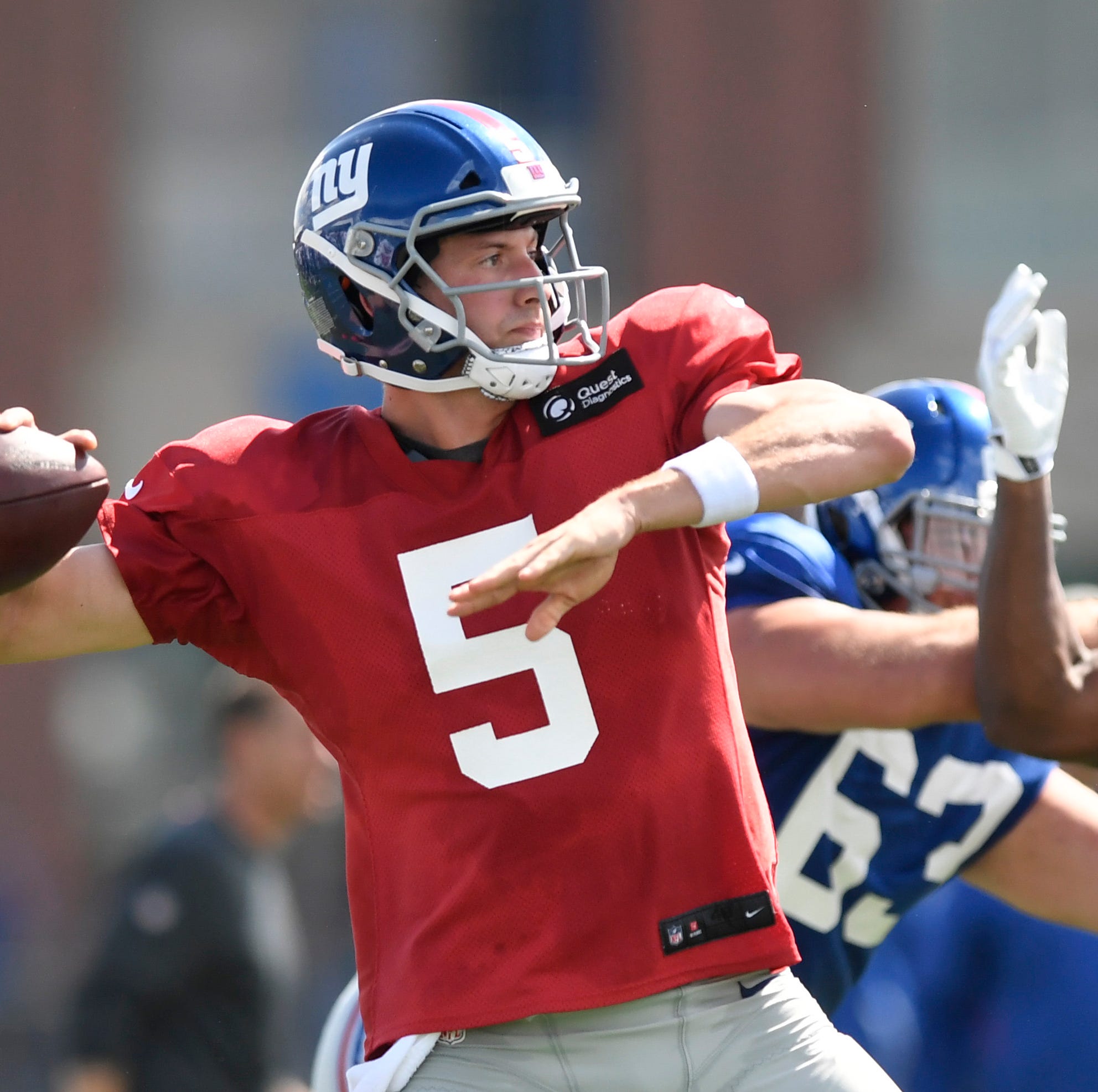New York Giants quarterback Davis Webb (5) throwing the ball during NFL training camp in East Rutherford, NJ on Wednesday, August 1, 2018.
