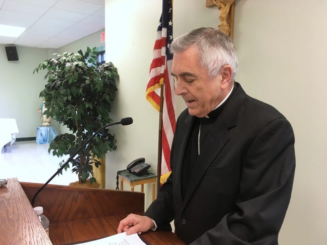Bishop Ronald Gainer, of the Harrisburg Roman Catholic diocese, discusses child sexual abuse by clergy during a news conference Wednesday. The bishop apologized to victims and said the diocese was releasing a list of 71 priests and others in the church accused of the abuse.