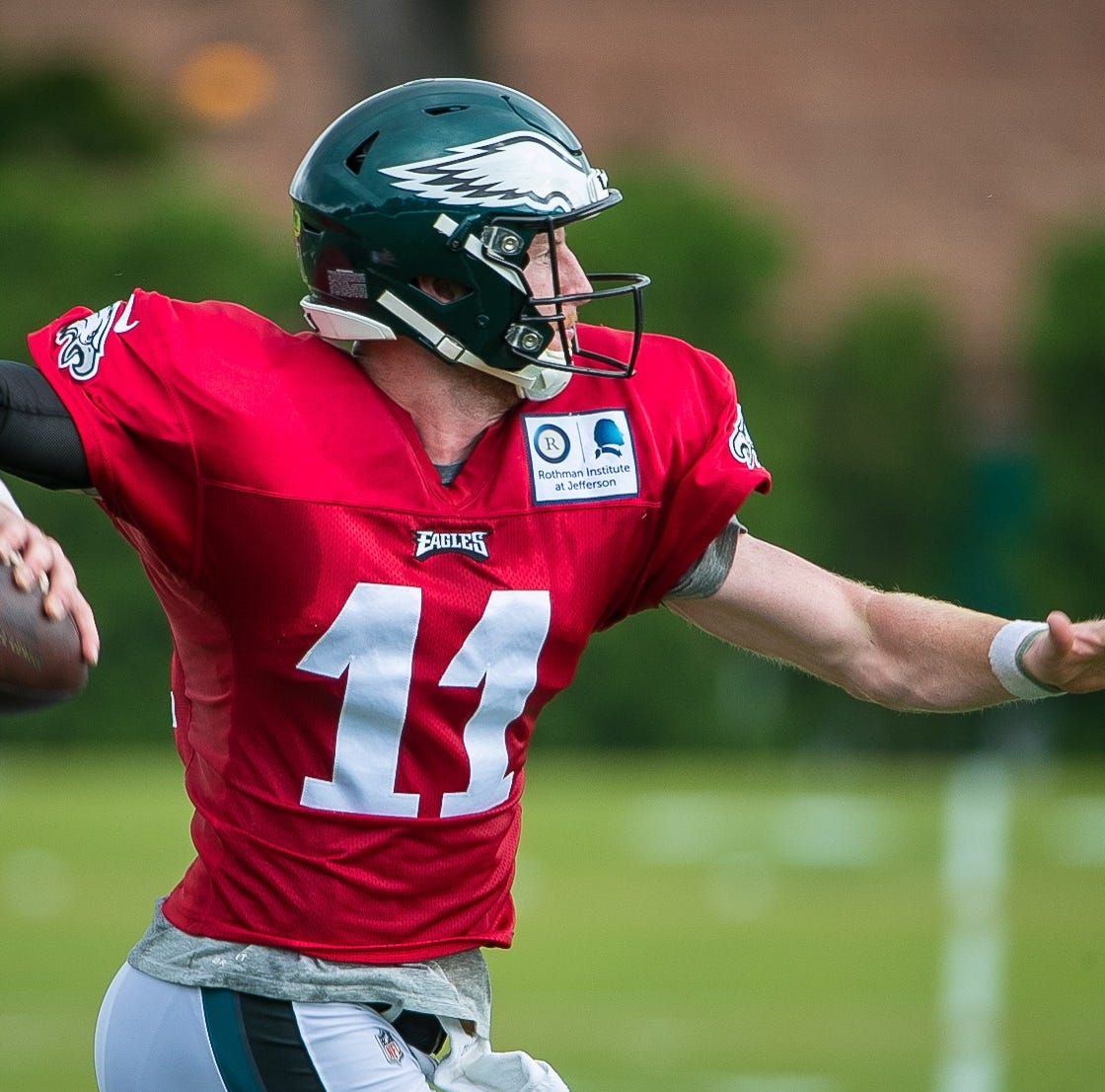 Eagles quarterback Carson Wentz runs practice drills at training camp Wednesday at the NovaCare Complex in Philadelphia.