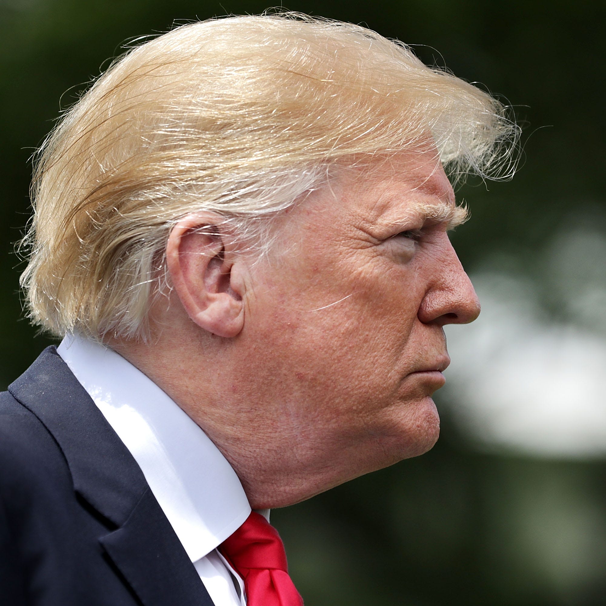*** BESTPIX *** WASHINGTON, DC - MAY 23:  U.S. President Donald Trump talks to journalists before departing the White House May 23, 2018 in Washington, DC. Trump is traveling to New York where he will tour the Morrelly Homeland Security Center and th