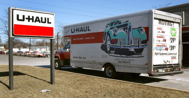 Amerco Real Estate, a unit of U-Haul International, has agreed to buy 13 Sears and Kmart stores.